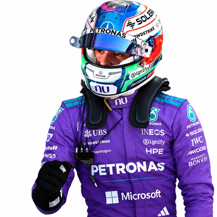 A Formula 1 driver in a purple Petronas Mercedes racing suit and a highly detailed blue, red, and white helmet, shown against a plain white background.