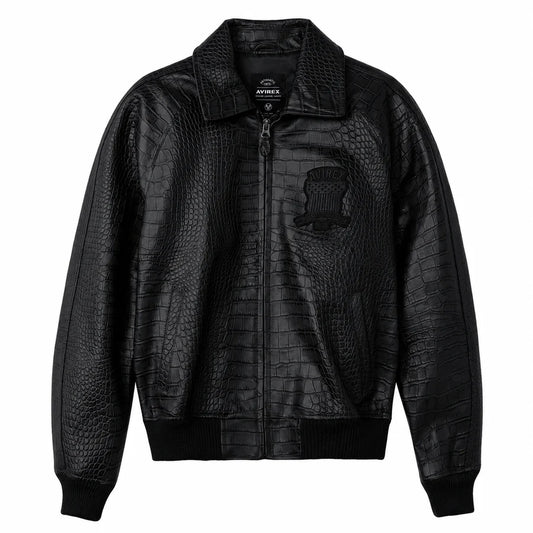 Black Avirex crocodile-texture leather jacket front view with zip closure, embroidered chest emblem and ribbed bomber cuffs on a white background.