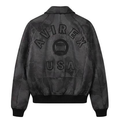 AVIREX dark camo leather jacket flat back product photo featuring AVIREX USA branding, camouflage texture, and classic bomber silhouette on a white background.