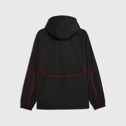 A black hooded jacket shown from the back, featuring vibrant red contrast stitching along the shoulder seams and a curved line across the upper back, set against a light gray background.