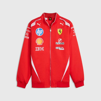 A red Scuderia Ferrari zip-up jacket by Puma, featuring sponsor logos including HP, Shell, UnCredit, and IBM on the front, displayed against a light gray background.