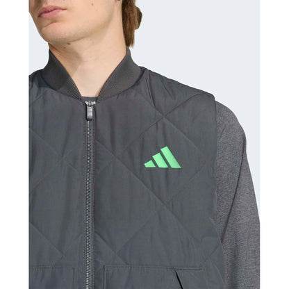 Close-up of grey premium sweat vest showing chest logo, quilted fabric and ribbed collar