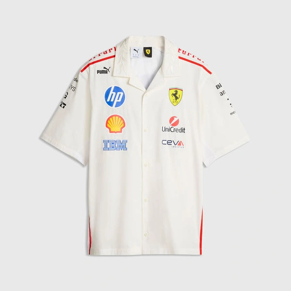 A white short-sleeve button-up shirt with Scuderia Ferrari branding, featuring sponsor logos including HP, Shell, and IBM, and the Scuderia Ferrari Ferrari shield on the chest.