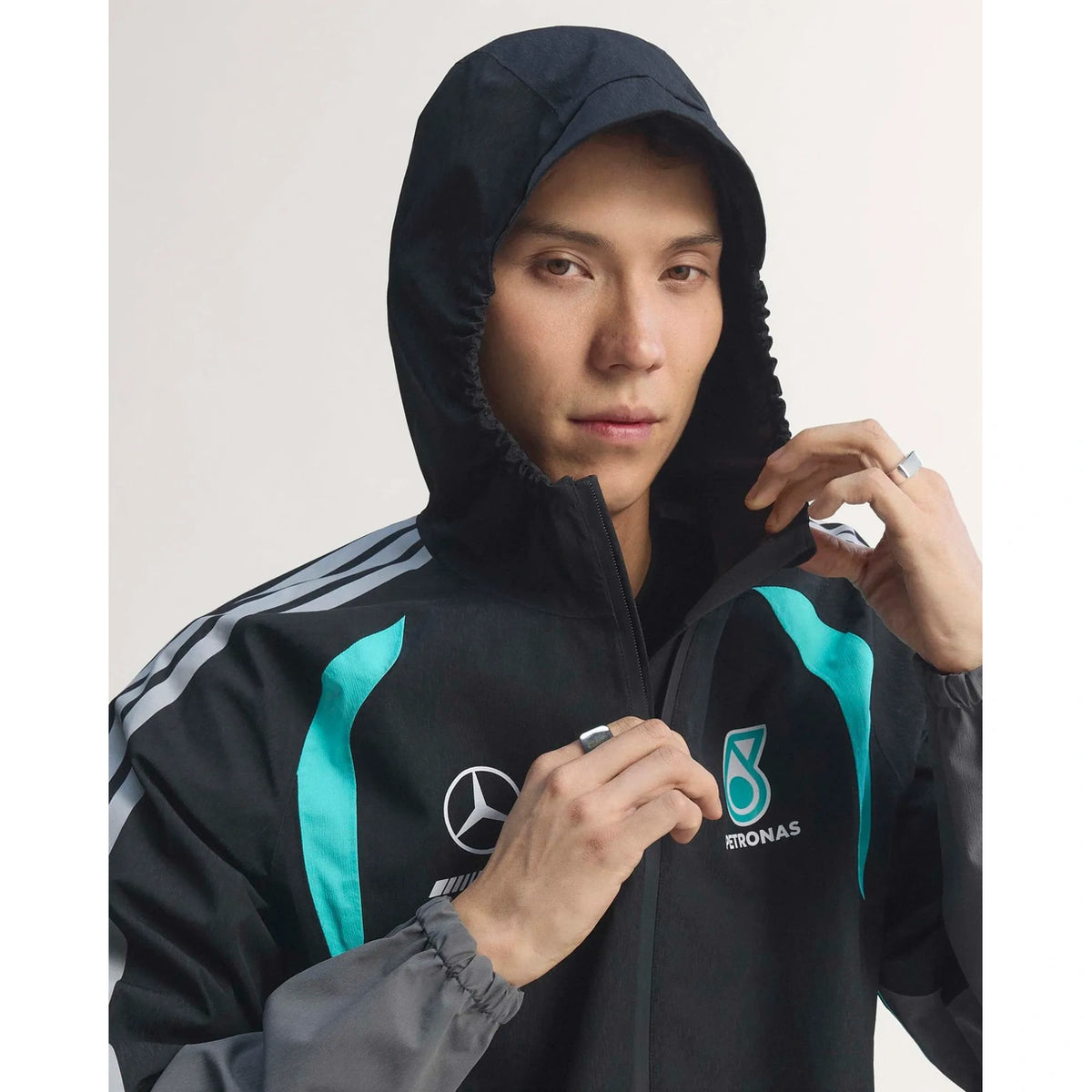 Mercedes F1 Engineers Jacket black close-up showing adjustable hood and premium racing details