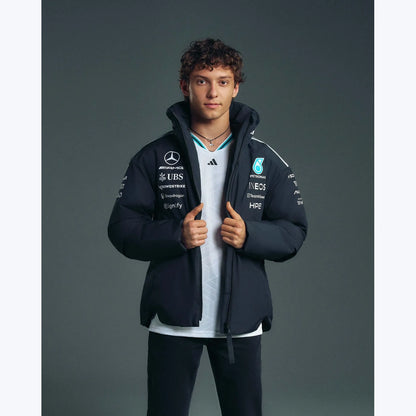 Mercedes F1 2026 black team jacket close-up showing detailed collar zipper and motorsport graphics