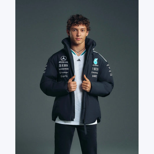 Mercedes F1 2026 black team jacket close-up showing detailed collar zipper and motorsport graphics
