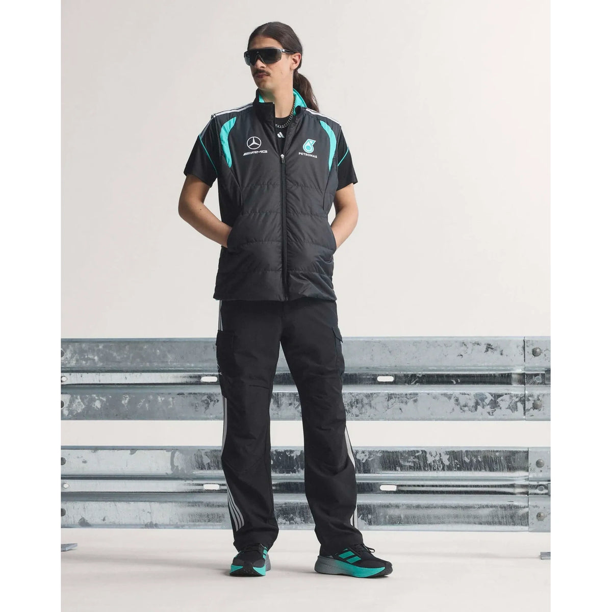 Mercedes AMG Petronas F1 mechanics vest black front view with teal accents and motorsport graphics