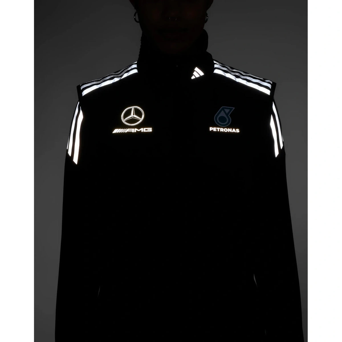 Women's black F1 mechanics vest motorsport detail